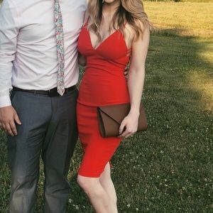 Red form fitting cocktail dress
